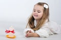 Beautiful little girl angel with a candle Royalty Free Stock Photo