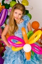 Beautiful little girl in balloon forest Royalty Free Stock Photo