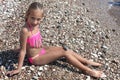 Beautiful little girl in a bikini posing Royalty Free Stock Photo