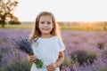 Beautiful Little Girl with Bouquet of Lavender Royalty Free Stock Photo
