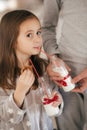 Beautiful little girl and boy hold jars of milk with Christmas decoration Royalty Free Stock Photo