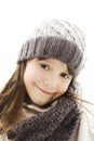 Beautiful little girl in cap and scarf. Royalty Free Stock Photo