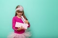 Birthday girl opening a present Royalty Free Stock Photo