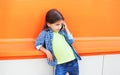 Beautiful little girl child talking on smartphone in city Royalty Free Stock Photo