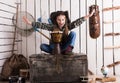 Beautiful little girl in cowboy hat with drum Royalty Free Stock Photo