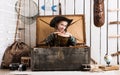 Beautiful little girl in cowboy hat with drum Royalty Free Stock Photo