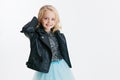 Beautiful little girl with curly blonde hairstyle on the holiday party in dress with sequins and black jacket. Silver Royalty Free Stock Photo