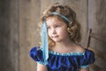 Beautiful little girl with curly hair