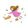 Beautiful little girl and a cute cartoon cat flying with autumn leaves. Royalty Free Stock Photo