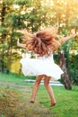 Beautiful little girl  Is dancing outside at  summer sunset. Soft focused Royalty Free Stock Photo