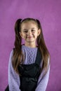 beautiful little girl in dress standing and posing isolated over plain background. Royalty Free Stock Photo