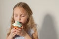 Beautiful little girl eating sweet candy lollipop cake Royalty Free Stock Photo