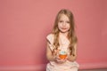 Beautiful little girl eating sweet candy lollipop cake Royalty Free Stock Photo