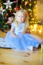 Beautiful little girl in a festive interior Royalty Free Stock Photo