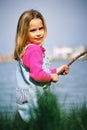 Beautiful little girl fishing Royalty Free Stock Photo