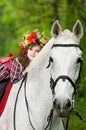 Beautiful little girl in floral wreath Royalty Free Stock Photo