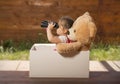 Beautiful little girl having fun playing outdoors