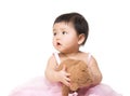 Beautiful little girl holding bear and looking another side Royalty Free Stock Photo