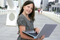 Beautiful little girl with laptop computer Royalty Free Stock Photo