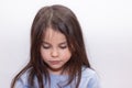 Beautiful little girl with long hair and eyelashes Royalty Free Stock Photo