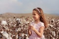 Little girl in the cotton field.