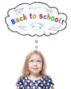 Beautiful little girl looking up on Back to school isolated Royalty Free Stock Photo
