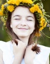 Beautiful little girl, outdoor, color bouquet flowers, bright sunny summer day park meadow smiling happy enjoying life Royalty Free Stock Photo