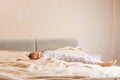 Beautiful little girl in pajamas lying on the bed at home. Stay at home during coronavirus covid-19 lockdown and have a fun. Happy Royalty Free Stock Photo