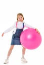 Little girl plays with a big ball for fitness Royalty Free Stock Photo