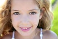 Beautiful little girl portrait smiling closeup face