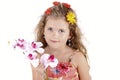 Beautiful little girl posing with orchid Royalty Free Stock Photo