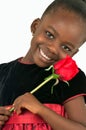 Beautiful little girl with red rose Royalty Free Stock Photo