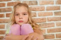 Beautiful little girl is sad Royalty Free Stock Photo