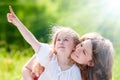 Beautiful little girl showing to her mother Royalty Free Stock Photo