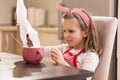 Pouring cereal into a bowl with milk Royalty Free Stock Photo