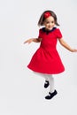 Beautiful little Girl smiling in red dress