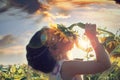 Beautiful little girl and sunflower Royalty Free Stock Photo