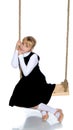 Little girl swinging on a swing Royalty Free Stock Photo