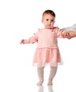 Little baby girl doing first step with parent help Royalty Free Stock Photo