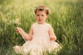 Beautiful little girl in wreath of flowers Royalty Free Stock Photo