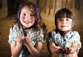 Beautiful little girls dressed as a traditional