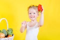 Beautiful little happy girl with basket of vegetables and fruits Royalty Free Stock Photo