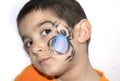 Beautiful little kid boy with face painted with a spider Royalty Free Stock Photo