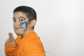 Beautiful little kid boy with face painted with a spider Royalty Free Stock Photo