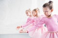 beautiful little kids in pink clothing dancing Royalty Free Stock Photo