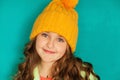 Beautiful little lady in yellow woolen cap