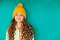 Beautiful little lady in yellow woolen cap