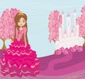 Beautiful little princess in front of her castle Royalty Free Stock Photo