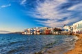 Beautiful Little Venice, Mykonos, Greece. Romantic neighborhood with whitewashed bars, cafes, restaurants. Sunset sky Royalty Free Stock Photo