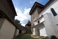 The beautiful little village of Viscri and the castle in the heart of rural Romania countryside in Transylvania on the top of the Royalty Free Stock Photo